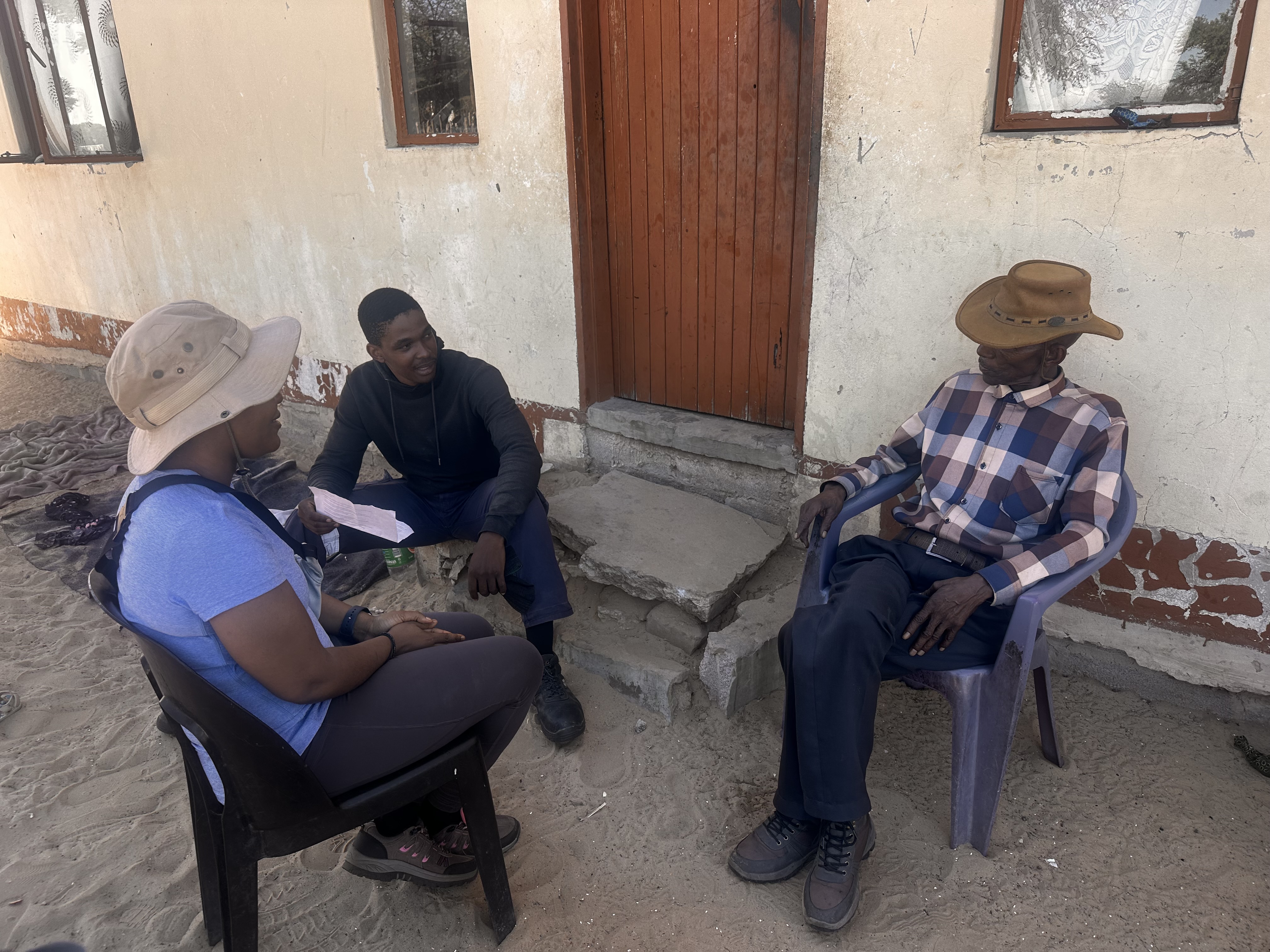 Conducting a Key Informant Interview with the Kgosi of Ngwatle Village regarding local climate resilience.